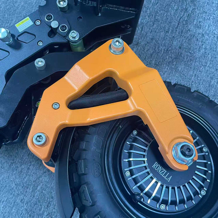 Close-up of the orange left front swing arm installed on a Ronzlla RZ2 electric scooter wheel