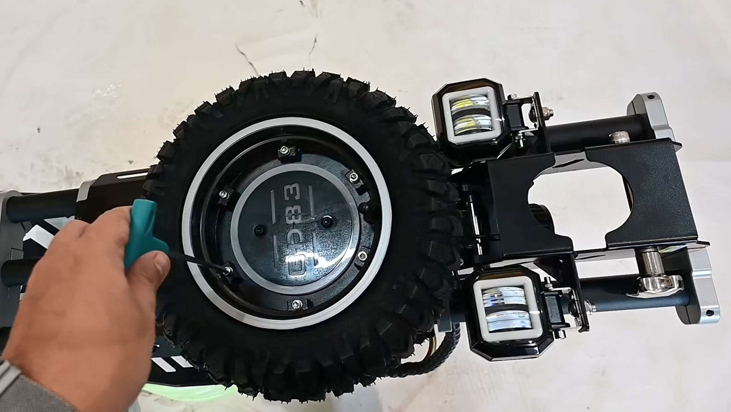 Close-up of the 11-inch widened off-road pneumatic spare tire wheel for Glidezone GD83.