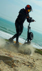 Photo of an adult rider effortlessly climbing a steep 45-degree slope incline with Glidezone GD83.