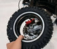 Close-up of the tool-free quick-release wheel design on the single-sided swingarm of Glidezone GD83.