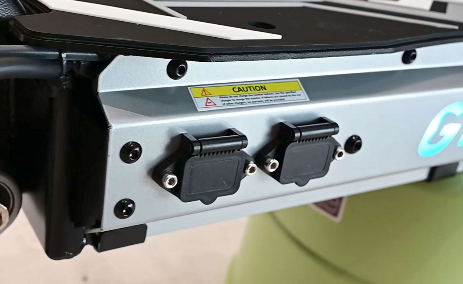 Close-up of the dual charging ports on the Glidezone GD83 for faster dual-charger charging.