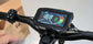 Close-up shot of the Glidezone GD83 smart LCD display power-on screen showing speed and battery indicators.