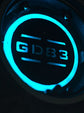 Close-up of the custom ambient LED light glowing near the quick-release wheel hub of Glidezone GD83.