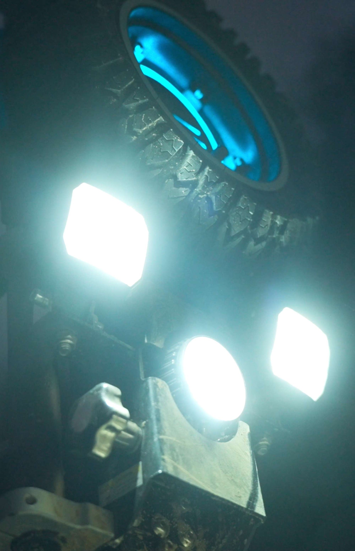 Front view close-up of the three matrix LED headlights on Glidezone GD83 providing powerful night visibility.